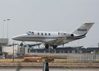 N501KR @ KAUS - Citation OG touches down 17L. - by Darryl Roach