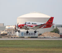 160978 @ KAUS - USMC Beech touches down 17L. - by Darryl Roach