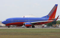 N423WN @ KAUS - SWA B737 departs 17L. - by Darryl Roach