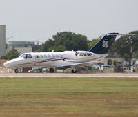N247MV @ KAUS - Citation biz jet with an actual logo on it. - by Darryl Roach