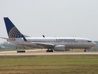 N15710 @ KAUS - COA B737 taxis to 17L. - by Darryl Roach