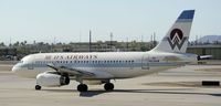 N828AW @ KPHX - Taxiing at PHX - by Todd Royer