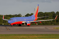 N738CB @ ORF - Southwest Airlines N738CB (FLT SWA21) exiting RWY 5 after arrival from Baltimore/Washington Int'l (KBWI).