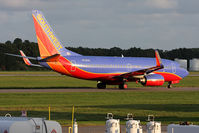 N738CB @ ORF - Southwest Airlines N738CB (FLT SWA21) taxiing to the gate via taxiway Charlie after arrival from Baltimore/Washington Int'l (KBWI).