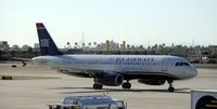 N675AW @ KPHX - Taxiing at PHX - by Todd Royer