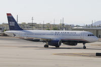 N637AW @ KPHX - Taxiing at PHX - by Todd Royer