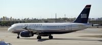 N672AW @ KPHX - Taxiing at PHX - by Todd Royer