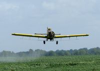N91968 - Dusting a field about 10 miles north of Natchitoches, Louisiana. Fun to watch and I bet is fun to do! - by paulp
