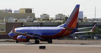 N488WN @ KPHX - Landing at PHX - by Todd Royer