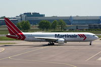 PH-MCM @ EHAM - Martinair - by Chris Hall