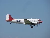 N737H @ KOSH - Toucjhing down at Oshkosh 2010 during mass arrivals