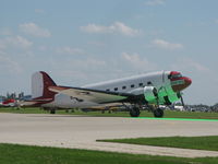 N737H @ KOSH - Crossing the Green Dot on runway 09/27 at EAA Oshkosh 2010