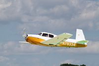 N79334 @ KOSH - Mooney M20C - by Mark Pasqualino