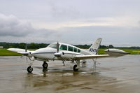 N3474Q @ IKV - On a rainy ramp - by Glenn E. Chatfield