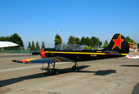 N7092A @ KRHV - 1983 YAK-52 at mod center - by Steve Nation