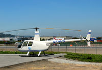 N7194U @ KSQL - Home-based 2001 R44 at San Carlos, CA - by Steve Nation