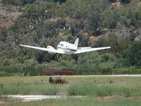 N73MH @ POC - Taking off from runway 26L and heading west - by Helicopterfriend