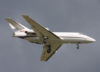 N283SA @ YIP - Falcon 20