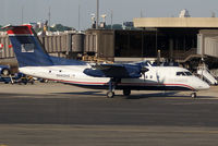 N943HA @ KEWR - Arriving at the terminal at Newark Liberty. - by Doug Wolfe