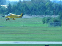 C-GAKX @ CYOO - Not the clearest i admit.  But it's hard to get a good pic when you're a few hundred yards away 3 stories up overlooking the airport....lol