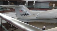 N10BD @ KDEN - Sorry for the poor photo, I accidentally deleted the full photo of this plane on my camera. This is Learjet N10BD, the first corporate jet to ever fly into Denver International Airport. Now it's hanging on display in concourse C. - by Kreg Anderson