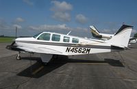 N4562M @ KAXN - Beech A36 Bonanza on the line. - by Kreg Anderson