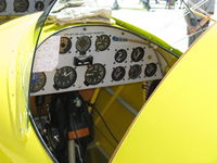 N43PK @ CMA - 2004 Krugh STEEN SKYBOLT, Lycoming AEIO-360 220 Hp, aerobatic with full inverted systems, rear panel (in the office) - by Doug Robertson