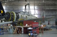 N47DG - Republic (Curtiss) P-47G-10CU (P-47D-5-RE) Thunderbolt being worked on at the Imperial War Museum, Duxford