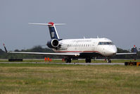 N450AW @ ORF - US Airways Express (Air Wisconsin) N450AW (FLT AWI3581) taxiing to RWY 5 via Taxiway Charlie for departure to Philadelphia Int'l (KPHL).