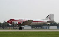 N143D @ KOSH - Douglas DC3A - by Mark Pasqualino