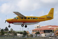 N900HL @ TNCM - Cessna 208B, c/n: 208B1295 - by Trevor Toone