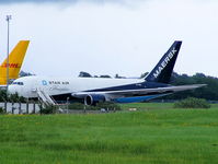 OY-SRG @ EGAA - in Maersk colour scheme and wearing Star Air titles - by Chris Hall