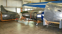 N86481 @ KBDL - This aircraft is currently undergoing a full restoration at NEAM; several completed sections are on display. - by Daniel L. Berek