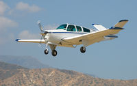 N9599Q @ REI - Short final for Runway 26. - by Marty Kusch