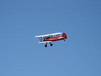 N66711 @ CMA - 1941 Boeing Stearman IB75A, Jacobs R-755 B2 275 Hp, overflight - by Doug Robertson
