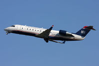 N428AW @ ORF - US Airways Express (Air Wisconsin) N428AW climbing out from RWY 5 en route to Reagan National (KDCA) as Flight AWI925A.