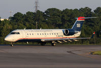 N427ZW @ ORF - US Airways Express (Air Wisconsin) N427ZW exiting RWY 5 at Taxiway Foxtrot after arrival from Charlotte/Douglas Int'l (KCLT) as Flight AWI4037.