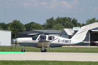 C-FMIT @ KOSH - Socata TB-20 - by Mark Pasqualino