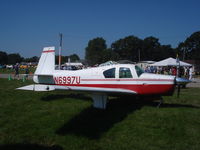N6997U @ KOSH - Mooney M20C - by Mark Pasqualino