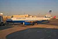N411UA @ KBOS - United Airlines Airbus A320-232, N411UA gate C17 KBOS getting ready to push for KORD. - by Mark Kalfas
