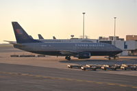 N313UA @ KBOS - United Airlines Boeing 737-322, N313UA at C20 KBOS. - by Mark Kalfas