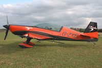 G-ZXEL @ X5FB - Extra EA-300L at Fishburn Airfield, UK in October 2009. - by Malcolm Clarke