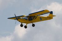 N941JH @ OSH - Arriving at Airventure 2010 - Oshkosh, Wisconsin