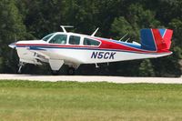N5CK @ OSH - Departing Airventure 2010 - Oshkosh, Wisconsin - by Bob Simmermon