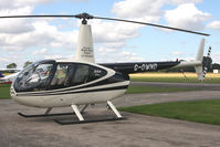 G-OWND @ EGBR - Robinson R44 Astro at Breighton Airfield's Summer Madness All Comers Fly-In in August 2010. - by Malcolm Clarke