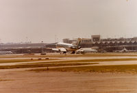 N718RC @ KMSP - Republic 727-200 landing rwy 11L.