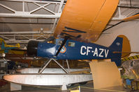 CF-AZV @ CYWG - Stinson SR8CM - by Andy Graf-VAP