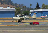 N2347A @ KCCR - Southern California-based 1969 Beech E33 rolling out on RWY19L with flaps down at Buchanan Field - by Steve Nation