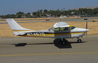 N7457Q @ KCCR - 1972 Cessna 182P taxis past public viewing area at Buchanan Field - by Steve Nation