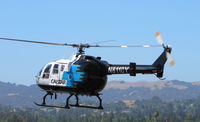 N8118Y @ KCCR - CALSTAR 1989 BO105LS landing at Buchanan Field - by Steve Nation